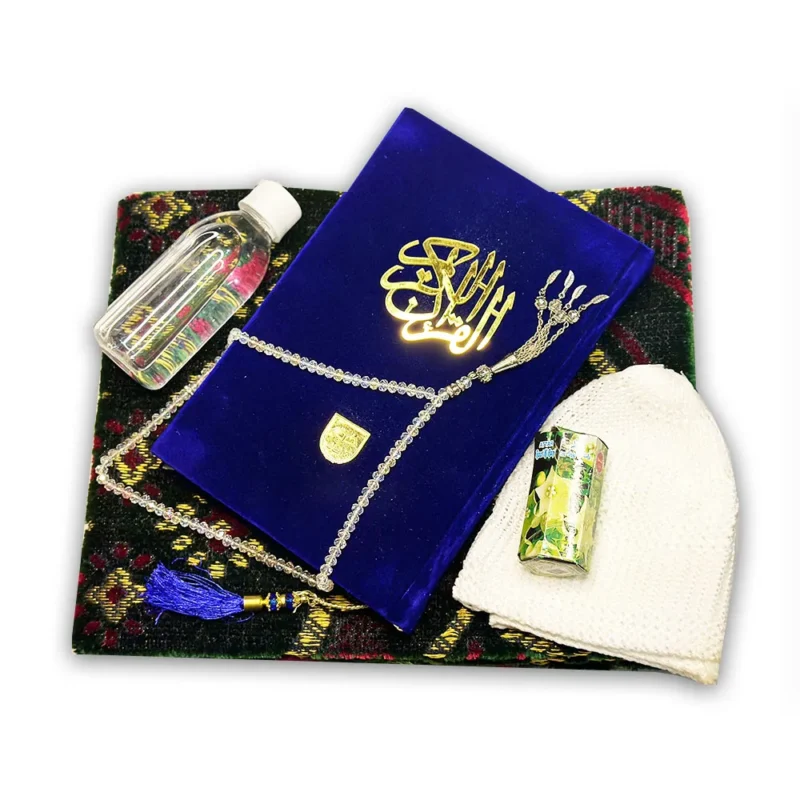 Special Ramzan Gift Pack including a Fancy Tajweedi Quran, Tasbih, Prayer Cap, Jainimaz, Ittar, and Zam Zam, ideal for Islamic occasions.